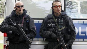 FILE: German police officers: conduct raids on suspected drug dens