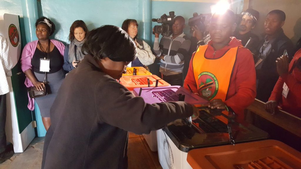 A voter performs a civic duty