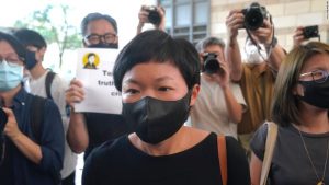 Hong Kong journalist Choy Yuk-ling, also known as Bao Choy, arrives a court in Hong Kong Thursday, April 22, 2021.??Hong Kong journalist Choy Yuk-ling appeared in court on Thursday for verdict on charges of making false statements while obtaining information from a vehicle database. Choy, a producer at public broadcaster Radio Television Hong Kong, was arrested in Nov 2020. She was involved in the production of an investigative documentary into the behavior of Hong Kong police during 2019 anti-government protests, after the force was accused of not intervening during a violent clash between protesters and a mob of men in a subway station. (AP Photo/Kin Cheung