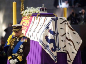 Philip’s coffin draped with his personal standard and was driven in a green military Land Rover Defender.