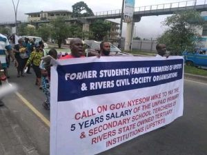Former students of the Demonstration schools demonstrating in support of the teachers