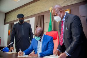 Obaseki (middle), Speaker, Hon. Marcus Onobun (left) and Clerk of the House, Alhaji Audu Yahaya Omogbai (right)