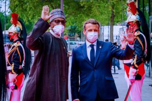 President Buhari and President Macron on arrival of the Nigerian president at Grand Palais Éphémère for the Plenary Session of the African Finance Summit in Paris, France on 18th May 2021