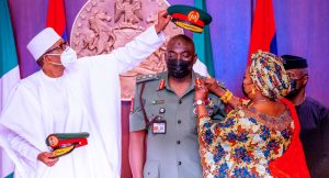 President Buhari decorating the late Attahiru soon after he was appointed the COAS earlier this year