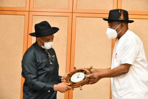 Governor of Rivers State, Nyesom Ezenwo Wike (right) receiving a plaque from the Director General of the Nigerian Maritime Administration and Safety Agency (NIMASA), Dr. Bashir Yusuf Jamoh (left) during the latter's courtesy visit at Government House, Port Harcourt on Tuesday.