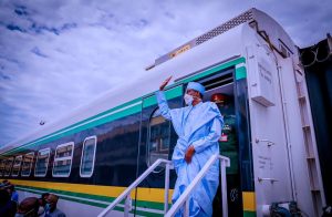 President Buhari alighting from one of the coaches for Lagos -Ibadan railway after the commissioning on Thursday