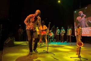 Dede Mabiaku entertaining the audience with songs 60s-70s at the event