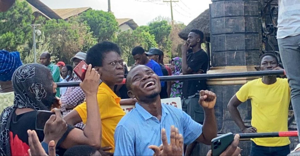 Some members of SCOAN weeping outside the church on Sunday( Photo: Taiwo Okanlawon)
