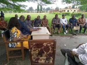 Chairman,Dr Lloyd and a cross section of the staff of Emohua local government Council hold first official meeting with Staff under tree