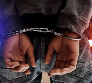 FILE PHOTO: Arrested suspect