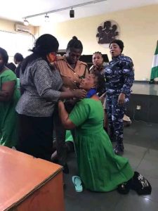 The female convicts, Ada Ebere and Favour Godwin resisting attempt to take them to prison after their conviction in a child theft suit