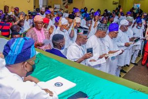Governor Oyetola and the Council Caretaker Committees during the oath taking ceremony