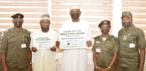 Salihu Manzo, Senior Park Ranger, State House, Dr Haruna Tanko, Head Veterinary Unit, State House, Tijjani Umar, Permanent Secretary, State House, Kehinde Abidemi, Assistant Conservator of Parks and WildLife Curator, State House, and Zakari Ibrahim, Assistant Park Inspector, during a courtesy visit to the Permanent Secretary, State House as part of activities to commemorate World Ranger Day. Friday, July 30, 2021