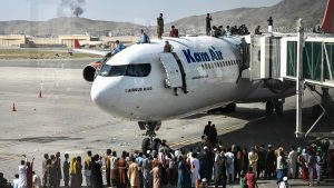 Desperate Afghans besiege Kabul Airport to get out of the country after take over by the Taliban