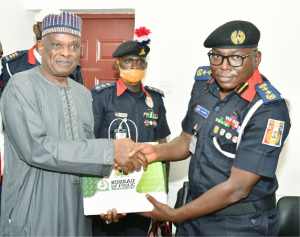 L-R: Director-General, BPP, Mamman Ahmadu, FNIQS presenting a set of the BPP document to the Commandant General, NSCDC, Dr. Ahmed Abubakar Audi during the courtesy visit