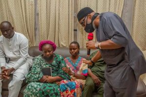 Governor Akeredolu consoling widow of late Adedayo and other members of the family during the visit