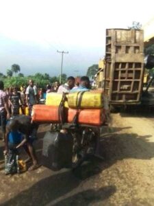 People scooping diesel from fallen tanker at Etche road in Etche local government area of Rivers