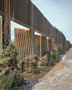 Section of Trump's border wall affected by flooding