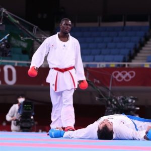 Saudi Arabia's Tareg Hamedi disqualified for a kick to Iran’s Sajad Ganjzadeh head in men’s +75kg kumite Olympic karate. The Iranian (on the floor) was declared winner of the gold medal after high drama at the famed Budokan arena on Saturday.