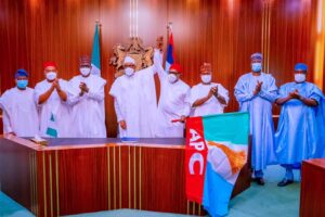 President Buhari with L-R: Osun State Governor Gboyega Oyetola, Imo State Governor Hope Uzodinma, APC Chairman Caretaker Committee and Yobe State Governor H.E. Mai Mala Buni, APC Candidate for the Anambra Gubernatorial Elections Senator Andy Uba, Kogi State Governor Yahaya Bello, SGF Boss Mustapha and Minister of Special Duties Senator George Akume as he presented Flag to APC Candidate for the Anambra Gubernatorial Elections Senator Andy Uba in State House on 31st Aug 2021