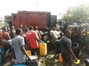 People scooping diesel from fallen tanker at Etche road in Etche local government area of Rivers