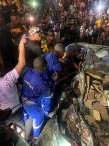 Officials of the Lagos State Emergency Management Agency and other agencies trying to rescue the victims on Sunday in Lagos