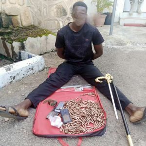 The alleged police sergeant with the ammunition found in his possession when he was arrested