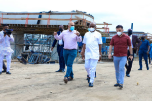 Governor of Rivers State, Nyesom Ezenwo Wike (middle) and the Project Manager, Julius Berger Nigeria Plc, Engineer Taner (left) during inspection of work at the Nkpolu -Oroworukwo Flyover, Port Harcourt on Sunday.