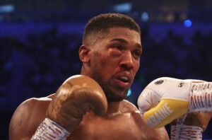 Joshua's eye battered by Oleksandr Usyk of Ukraine who defeated him to claim the WBA, IBF and WBO titles after he was given the nod by all three judges.