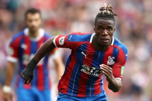 Wilfried Zaha scored early while Conor Gallagher grabbed a late second as City finished the game with 10 men
