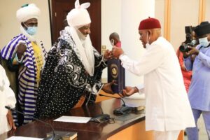 Governor of Rivers State, Nyesom Ezenwo Wike (right) presenting a souvenir to former Emir of Kano and Grand Khaleefa of the Tijaniyyan Order in Nigeria, His Royal Highness, Muhammad Sanusi II (left), during the latter's courtesy visit to the Governor, at Government House, Port Harcourt on Sunday.