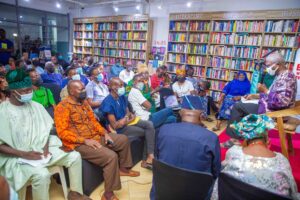 Professor Osundare reading from one of his books to the audience at the book reading tagged An Evening with Professor Osundare which held at Roving Heights in Victoria Island, Lagos on Sunday 20 February 2022 ( Photo: Ayo Efunla)