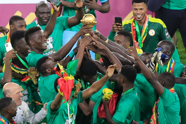 Senegalese players celebrating AFCON 2021 victory