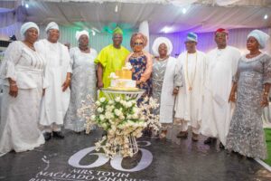 Mr and Mrs Bayo Onanuga(middle) with TESCOM Board members