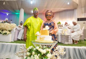 The celebrant, Mrs Toyin Machado-Onanuga with her husband Mr Bayo Onanuga during the cutting of the cake