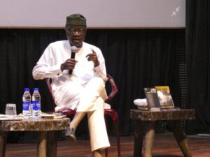 Mr Ajibade reading an excerpt about the late Dr_ Beko Ransome-Kuti from his collection of essays 'What A Country'_ Photo by Adefoyeke Ajao