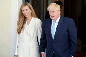 British Prime Minister Boris Johnson and wife Carrie arrive for the official welcome ceremony during the G7 summit in Schloss Elmau, near Garmisch-Partenkirchen, Germany June 26, 2022. Stefan Rousseau/Pool via REUTERS/File Photo.