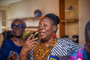 Professor Peju Layiwola addressing guests at the unveling of her new clothing collection in collaboration with Ashluxury in Lagos