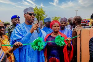 Governor of Borno State, Babagana Umara Zulum and the SSA to the President on SDGs, Princess Adejoke Orelope-Adefulire at the commissioning of 200 units of 2 bedroom houses in IDP Camp in Nganzai, Borno State