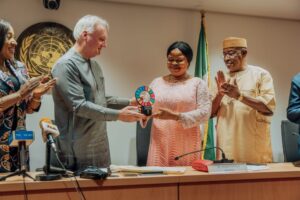 UN Resident and Humanitarian Coordinator in Nigeria, Mathias Schmale presenting the award to Princess Orelope-Adefulire