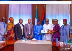 The National Policy Document on Eye Health being presented to President Tinubu