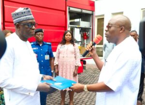 Governor Siminalayi Fubara presenting documents of the fire truck to Captain Muye Muktar, Director of Operations, FAAN at Government House on Monday.
