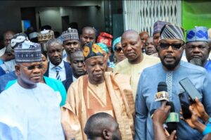 R-L: Yomi Awoniyi, Ganduje and Gov Bello