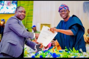 l-r: Newly appointed Commissioner for Information & Strategy, Mr. Olugbenga Omotoso receiving his letter of appointment from Governor of Lagos State, Mr. Babajide Sanwo-Olu during the swearing-in ceremony of new members of the State Executive Council, at Adeyemi Bero Auditorium, Secretariat, Alausa, on Wednesday, 13 September 2023.