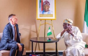 Presidents Tinubu, right of centre, and Azali Assoumani