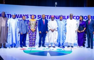 President Tinubu, fifth from right and others at the 29th Nigerian Economic Summit (NES) in Abuja, on Monday