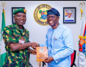 Chief of Army Staff, Lieutenant General Taoreed Lagbaja presents a complimentary plaque to Governor of Lagos State, Mr. Babajide Sanwo-Olu during a courtesy call to the governor at the Lagos House, Marina, on Monday, 09 October 2023