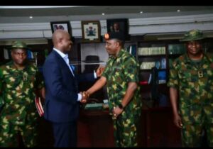 Dr. Tammy Danagogo, the Secretary to Rivers State Government,SSG, exchanges gifts with Brig-General Timi Markintoch, Deputy Director, Planning of the Army during advocacy visit to SSG's Office