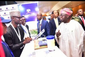 President of Federal Republic of Nigeria, Asiwaju Bola Ahmed Tinubu, discussing with Jibrin Abubakar of Dangote’s corporate communications department at the Dangote stand at the ongoing 29th Nigerian Economic Summit in Abuja on 23rd October 2023.