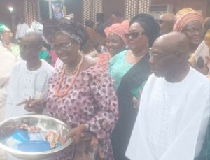 Chief Obasanjo, right, his wife Bola, centre and others at the occasion